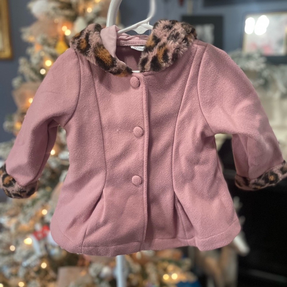 Pink fur trimmed coat
